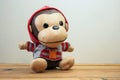 Monkey doll on wood table