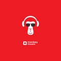 Monkey enjoys the music. Relaxing monkey in headphones and sunglasses. Logo for music studio. Album cover Royalty Free Stock Photo