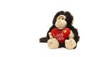 Monkey plushy toy with I Love U sign on white