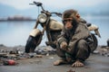 a monkey sitting on the ground next to a motorcycle