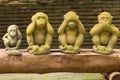 4 monkey statue in Thai temple