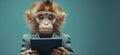 Monkey in Suit Holding Tablet with Serious Expression Against Blue Background Royalty Free Stock Photo