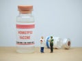 Monkeypox vaccine conceptual design with miniature of doctor.