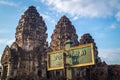 Monkeys climbing in front of a temple