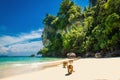 Monkeys waiting for food in Monkey Beach, Thailand Royalty Free Stock Photo