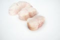 Monkfish tail steaks. over white