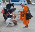 Monks blessing people