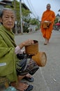 Monks collecting rice from village people