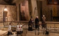 The monks after finishing prayer leave main altar of Church of the Annunciation in the Nazareth city in northern Israel Royalty Free Stock Photo