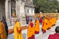 Monks in front of a Mahabodhi temple.