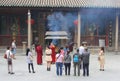 Praying Buddhist monks and devotion, Hualin temple, Guangzhou, China