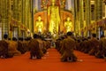 Monks praying at Wat Chedi Luang temple in Chiang Mai, Thailand
