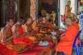 Monks praying in Wat Kaew Korawaram Temple