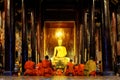 Monks praying in Wat Phan Tao