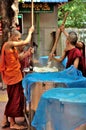 Monks Prepare to Eat Lunch Royalty Free Stock Photo