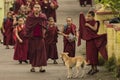 Monks returning from school