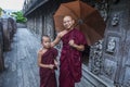 Monks at Shwenandaw Monastery in Mandalay , Myanmar Royalty Free Stock Photo