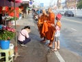 Monks blessing people