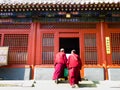 Monks walking inside the lama temple