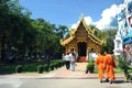 Monks walking at Wat Phra Singh temple