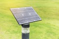 Mono crystalline silicon solar cells power outdoor lawn lamp ligh field on the green grass Royalty Free Stock Photo