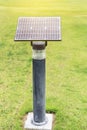 Mono crystalline silicon solar cells power outdoor lawn lamp ligh field on the green grass Royalty Free Stock Photo