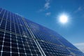 Mono-crystalline solar panels against a sunny sky Royalty Free Stock Photo