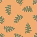 Mono print style scattered leaves seamless vector pattern background. Textured cut out grunge foliage green orange Royalty Free Stock Photo