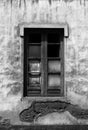 Monochorme broken window in a derelict abandoned house