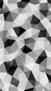 Monochromatic abstract geometric pattern composed of interlocking triangles and polygons in shades of black white and gray Royalty Free Stock Photo