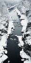 Monochromatic Depth: A Stunning Aerial View Of A Snow-covered River