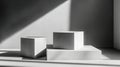 Three White Cubes in Indoor Studio With Light From Window Royalty Free Stock Photo