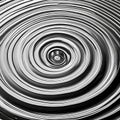 A monochromatic image of a single droplet of water creating ripples in a still pool, capturing a moment of tranquility5, Generat