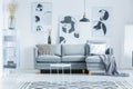 Monochromatic lobby with gray couch