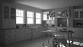 Monochrome, black & white interior design. Scandinavian classic kitchen with wooden details, dining table with chairs, pendant Royalty Free Stock Photo