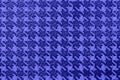 Monochrome blue houndstooth pattern on leather. Abstract fashion Background, texture Royalty Free Stock Photo