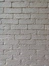 Monochrome brick wall of identical bricks for the entire background