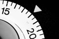 monochrome close-up of an old analog laboratory timer set to 18 Royalty Free Stock Photo