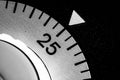 monochrome close-up of an old analog laboratory timer set to 25 Royalty Free Stock Photo