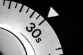 monochrome close-up of an old analog laboratory timer set to 30 Royalty Free Stock Photo