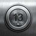 Monochrome Close-up of an Unlucky 13 Button Royalty Free Stock Photo