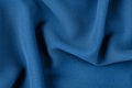 Monochrome decorative fabric in blue. Trend shade. Cloth backdrop. View from above. Copy space