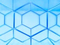 Monochrome geometric pattern of hexagons made of blue metal on a blue background. Concept background, abstraction