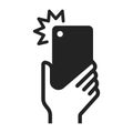 Monochrome human hand holding smartphone camera shot flare icon vector illustration