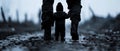 A monochrome image of an adult and a child, their hands interlinked, strolling through the rain Royalty Free Stock Photo