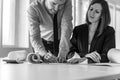 Monochrome image of architects at work in their office Royalty Free Stock Photo