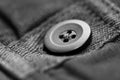 Monochrome image,button on new pants close up macro shot Royalty Free Stock Photo