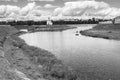 Monochrome image. Fascinating riverside scenery of the Tmaka River near its joining the river Volga. The City Of Tver, Russia. Royalty Free Stock Photo