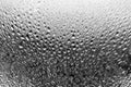 Monochrome image mirror glass surface with water drops, black and white gradient, shiny dew, rain or liquid on the glass surface Royalty Free Stock Photo