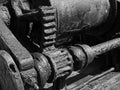 Monochrome image of old rusted machinery with corroded cogs and gears Royalty Free Stock Photo